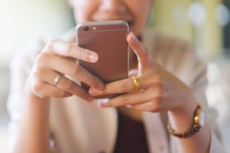 Woman browsing smartphone