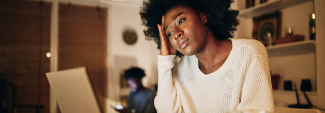 Distressed Teen in front of laptop